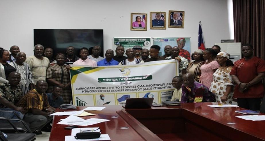 Participants pose for press