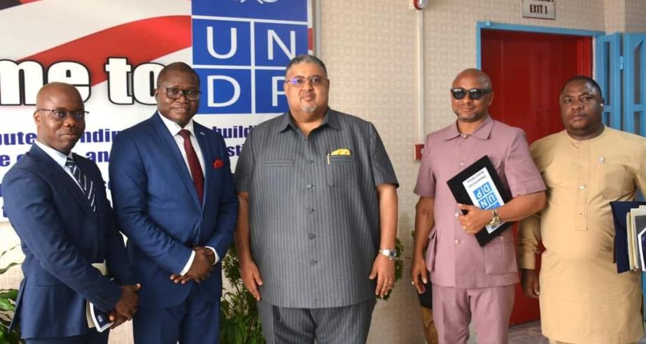 UNDP Acting Resident Representative Louis Kuukpen and Minister of Commerce & Industry Hon. Amin Modad unite at One UN House to fortify partnerships for sustainable development in Liberia.
