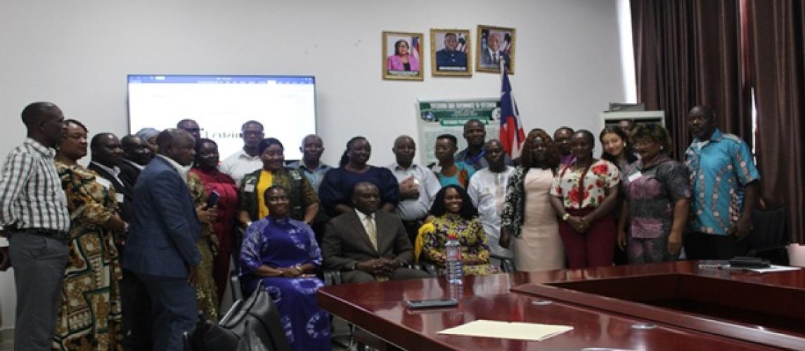 Participants pose for group photo