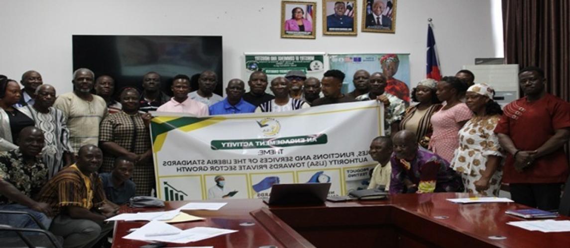 Participants pose for press